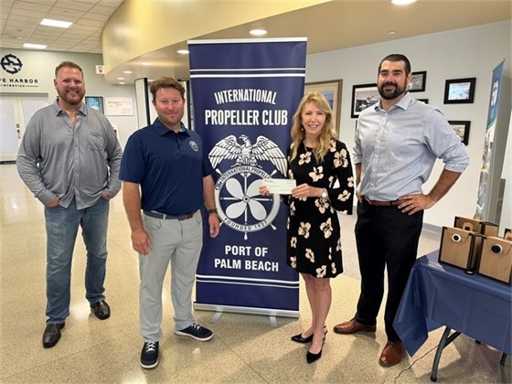 Propeller Club of the Palm Beach president, members and Anne Messer from Friends of Manatee Lagoon