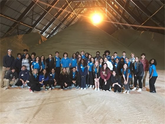 Students at sugar warehouse