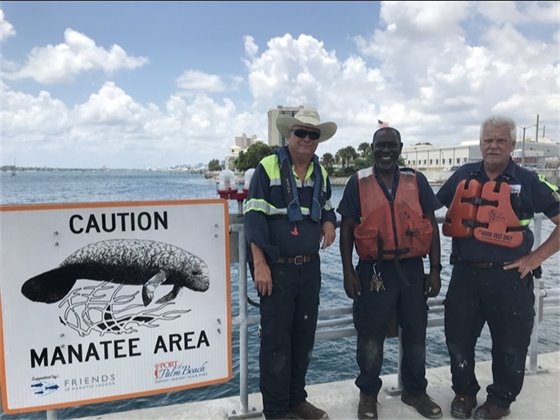 Port Facility workers Barry Cato, Ecklund Fredericks and David Pierce