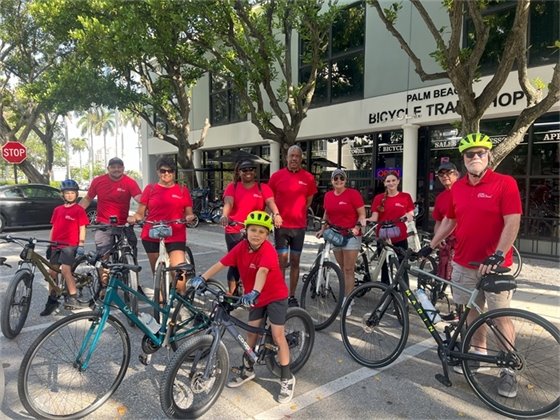 Port of Palm Beach employees outside bike shop