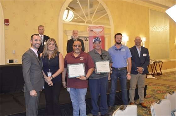 Tropical Shipping Team accepts safety awrads