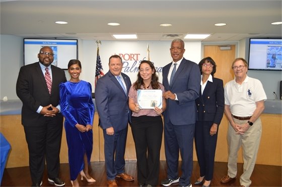 Port Commissioners, Executive Director Michael Meekins and intern Delis Silva Lopes.