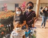 Kids receiving baskets