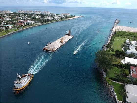 View of ship navigating through Lake Worth Inlet