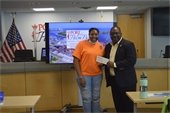 Chairman Anderson presenting donation to KOP Mentoring Network