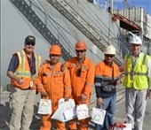 Crew members receiving donated gifts