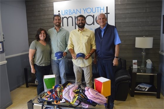 CEMEX Terminal Manager Matt Horne and CEO OF Southeast Hay Distributors delivering toys to Urban Youth Impact 