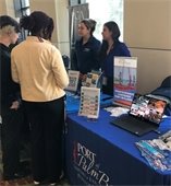 Students at exhibitor table