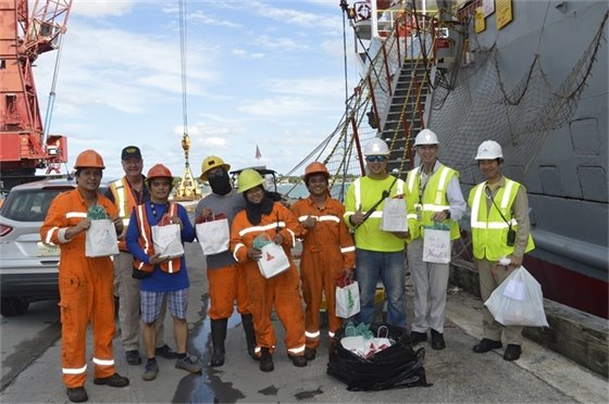 Crew members receiving donated gifts