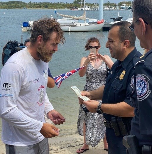 CBP officers checking Jack Jarvis' passport