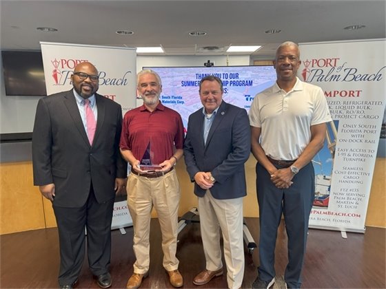 Commissioner Dr. Deandre Poole, Wayne Richards, Executive Director Michael Meekins and Executive Vice President Colin Macpherson