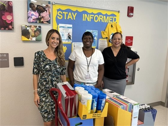 Port Public Information Officer Yaremi Farinas and HR Manager Raquel Rivera dropping off donations at Washington Elementary