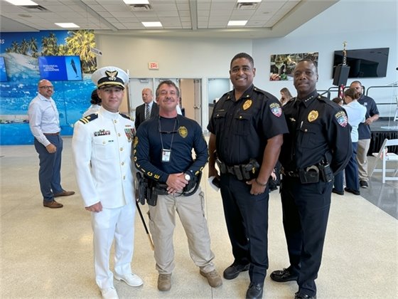 USCG Lt. Giacomo Terrizzi and Riviera Beach Police Officers and Chief Michael Coleman