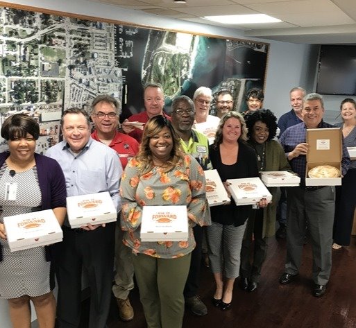 Port staff with pie donated pies