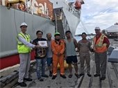 Crew members receive donated pies