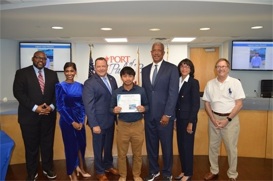 Port Commissioners, Executive Director Michael Meekins and Port Operations intern Lugwyn Lopez-Navarro.