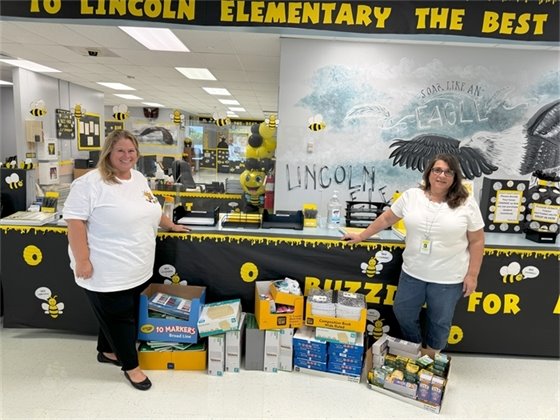 Lincoln Elementary School Principal Katrina Granger & Heavy Lift Sevices VP Tina Dias