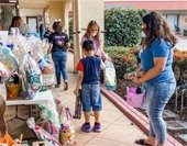 Kids receiving baskets 