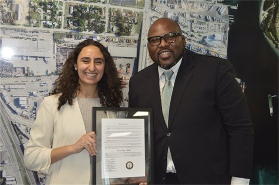 Valentina Facuse and Commissioner Deandre Poole