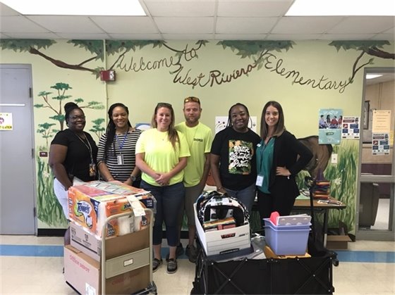 Port staff, RJ and Lisa Black and West Riviera Beach Principal
