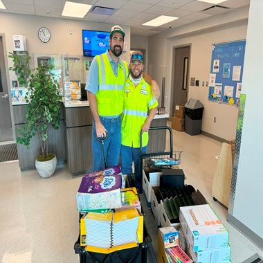 CEMEX staff donating school supplies